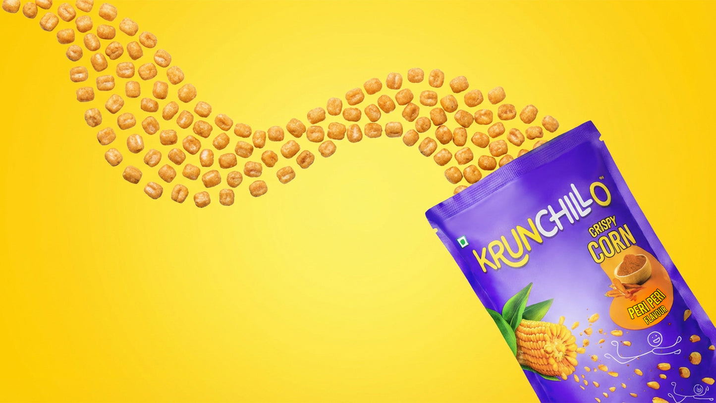 Krunchillo corn snack package with corn kernels on a yellow background