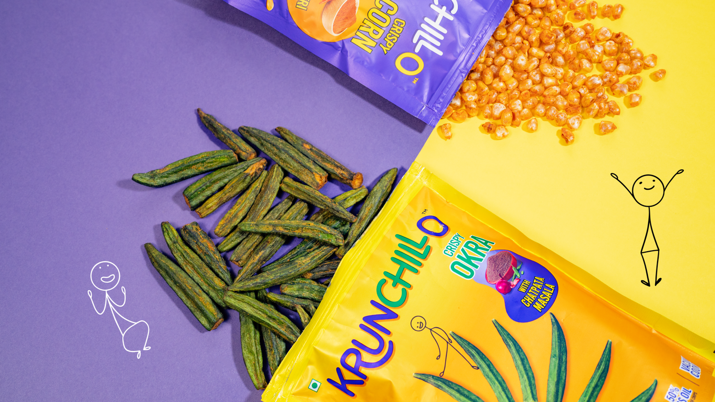 Krunchillo snack packaging with green and orange snacks on a purple and yellow background