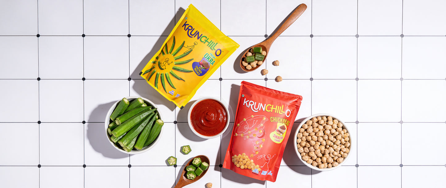Two bags of Krunchillo snacks on a grid background with ingredients and sauces.